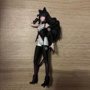 Cat-Themed Black and White Figurine